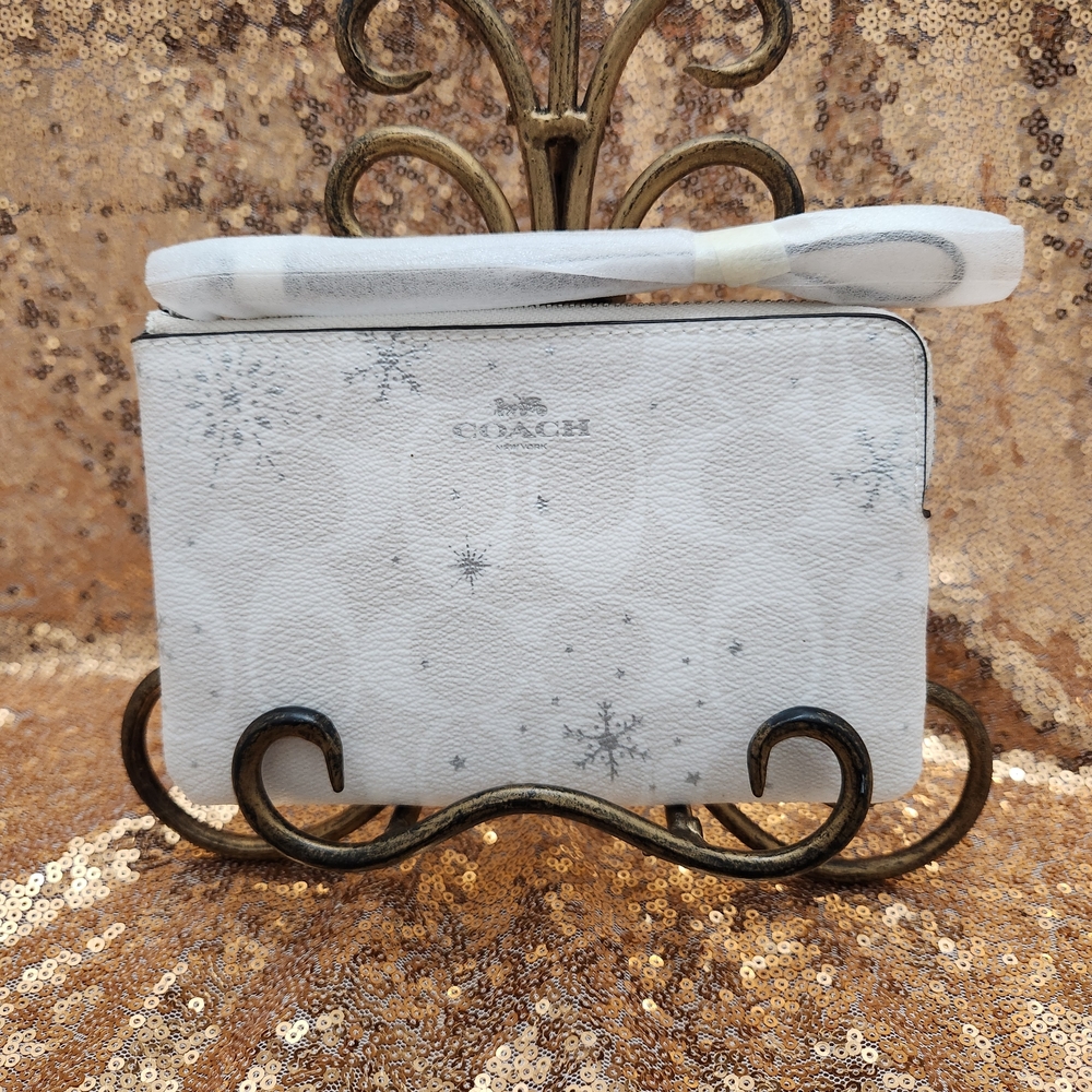 Coach White And Silver Snowflake Pattern Corner Zip Wristlet